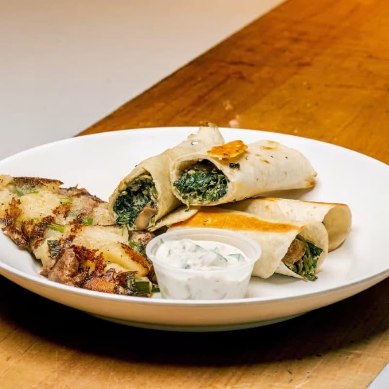 Spinach & feta rollups, catered by Brocheta Bistro